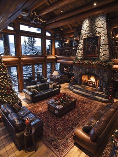 a living room filled with furniture and a fire place next to a large christmas tree