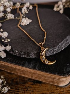 ✨Mystical Moon Necklace  | Dark cottagecore witch collection ✨ ⭐MATERIALS USED⭐ - Stainless Steel (tarnish resistant, more resistant than gold plated and safe for sensitive skin) ⭐REFUND INFORMATION⭐ - This product is not refundable - Please read all specifications before purchasing.  - Exception to refund policy at seller's discretion. - Cancellations in less than 24 hours are accepted (if it has not been sent).  - For detailed information or suggestions read our FAQ. 💗Thank you for visiting! Follow me on Instagram: @stesil.art💗 I usually post my new jewelry and art designs, promotion and giveaway on insta, don't miss it!✨ Moon-shaped Brass Necklace For Gift, Moon Shaped Brass Necklace For Gift, Magical Moon Phase Pendant Necklace, Mystical Clavicle Chain Jewelry As Gift, Mystical Clavicle Chain Jewelry For Gift, Magical Moon Phase Jewelry, Celestial Moon-shaped Stainless Steel Jewelry, Gold Stainless Steel Necklace With Moon Charm, Celestial Brass Necklaces For Gifts