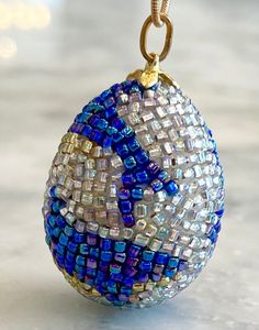 This is exquisite and in new condition. pendant is 1 1/2" tall and approx 1 1/4" wide. Snake Chain, Dolphins, Pendant Necklaces, Seed Beads, Jewelry Necklace Pendant, Egg, Jewelry Necklaces, Necklaces, Pendant Necklace