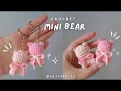 crochet mini bear keychain in pink and white with bow on it