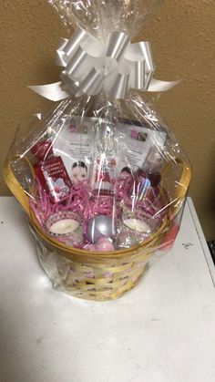 a basket filled with lots of items on top of a table