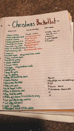 a christmas bucket list on top of a book