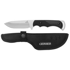 a knife that is sitting on top of a black sheath with the word gerber written on it