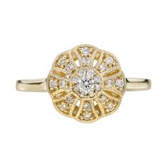 A lovely floral ring for anyone who loves antique-inspired jewelry. Made of diamonds set on 14k yellow gold. The twenty-five diamonds form a flower sit on the open worked floral motif for a beautifully feminine design that’s the perfect finishing touch to a special gift. Ring Information Metal: 14K Yellow Gold Total weight: 2.40 g. (approx. total weight) Ring size: US 3 – 8 available Center Gemstones Type: Diamond Average Color: H Average Clarity: SI Shape: Round Size: 2.2 mm. Number: 1 Weight: