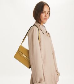 Lee Radziwill Shoulder Bag: Women's Designer Shoulder Bags | Tory Burch Designer Shoulder Bag With Gold-tone Hardware For Fall, Designer Crossbody Bag For Fall, Classic Travel Baguette Bag With Branded Hardware, Fall Shoulder Bag With Gold-tone Hardware Tote, Fall Satchel With Gold-tone Hardware, Fall Shoulder Satchel Bag With Gold-tone Hardware, Fall Travel Shoulder Bag With Gold-tone Hardware, Fall Travel Satchel With Gold-tone Hardware, Fall Shoulder Bag With Gold-tone Hardware For Shopping