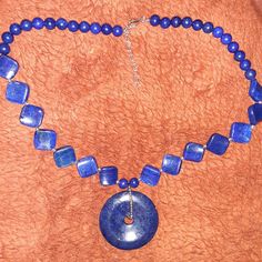 Beautiful, Deep Blue Lapis Lazuli Necklace With Silver Beads. 50mm Round Donut Shape 6mm-8mm Round Bead 16mm Concave Square Bead Necklace Is 20", With 2" Extension. Nwt, Never Worn. Royal Blue Lapis Lazuli Necklaces With Round Beads, Royal Blue Lapis Lazuli Necklace With Round Beads, Necklace With 8mm Round Lapis Lazuli Beads, Lapis Lazuli Round Beaded Necklaces, Lapis Lazuli Necklaces With 8mm Beads, Lapis Lazuli Necklace With 8mm Beads, Blue Lapis Lazuli Round Necklace, Sapphire Jewelry With 8mm Beads, Blue Lapis Lazuli Crystal Necklaces With Round Beads