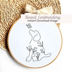 a hand embroidery pattern with an image of a giraffe on it and the text instant download image