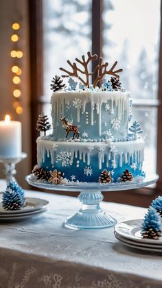 a blue and white cake sitting on top of a table