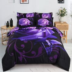 a bed with purple flowers on it in a room