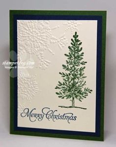 a christmas card with a tree on it