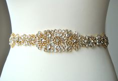 "Sophisticated and elegant bridal belt. Ready to ship The last picture shows one of my lovely brides wearing 13\" long sash , the one in the listing is longer is 30\" long. (thank you for sending me your beautiful picture!) This is unique luzury bridal belt with large rhinestone crystal applique. Fully encrusted with large crystals and rhinestones attached to satin ribbon. It will look great with any color dress, being either white, diamond, ivory, or antique. Looks great in the front , or on th Dresses Glamour, Dress Sash Belt, Wedding Dress Sash Belt, Sash Wedding Dress, Belt Wedding Dress, Dresses Corset, Bridesmaid Belt, Bridesmaid Sash, Dresses Winter