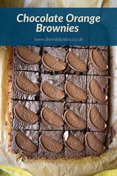 chocolate orange brownies on parchment paper with text overlay that reads chocolate orange brownies