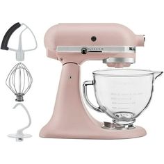 a pink mixer with a whisk attachment next to it