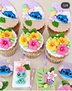 the cupcakes are decorated with fondant flowers