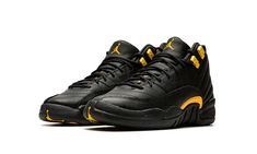 The Air Jordan 12 GS “Black Taxi” is the youth sizing of the mostly monochromatic black colorway of the retro basketball shoe that references its original “Taxi” look, but with a twist.  The “Black Taxi,” as suggested by its nickname, updates the Jordan 12’s original “Taxi” colorway with black accents in lieu of the “Taxi’s” predominantly white design.  The “Black Taxi” features a black leather upper instead of the “Taxi’s” white leather construction.  As for the rest of the shoe, a tonal synthe Leather Basketball Shoes For Streetwear, Sporty Jordan Shoes With Gum Sole, Black Basketball Shoes With Contrast Sole For Streetwear, Black High-top Basketball Shoes With Gum Sole, Black Sporty Basketball Shoes With Contrast Sole, Sporty Black Basketball Shoes With Contrast Sole, Casual Black Basketball Shoes With Gum Sole, Black Basketball Shoes With Gum Sole, Black Basketball Shoes With Gum Sole For Sports