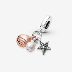 Inspired by the unique beauty of each seashell and pearl in the ocean, this triple charm features a trio of ocean treasures to bring the beach to your bracelet. Hanging from the bail are a sterling silver starfish with raised micro-beads, a freshwater cultured pearl and a 14k rose gold-plated seashell with realistic grooved detailing. The side of the bail has the message "You are my treasure." The perfect gift for the beachgoer in your life. Sterling silver and 14k Rose gold-plated unique metal You Are My Treasure, Stella Marina, Charms Pandora, Pandora Style, Pandora Bracelet Charms, You Are, Dangle Charms, Pandora Bracelet, Pandora Jewelry