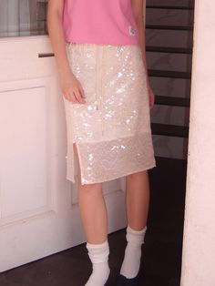 This is a casual and comfortable skirt that is made out of high quality polyester 100% fabric. With design detail of tone on tone banding shirring detail on the waist and boucle string on the waist, it gives a trendy and casual look. - Soft lining inside- Vent on the hem- Boucle waistband for adjustable size- Spangle detail overall Feminine Beige Skirt With Elastic Waistband, Casual Cream Party Skirt, Beige Mini Skirt For Night Out, Comfortable Skirts, Tone On Tone, Design Details, Casual Looks, Overalls, Skirt