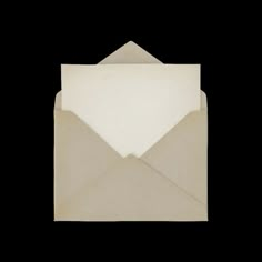 an open envelope on a black background