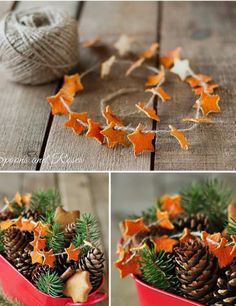 christmas decorations made out of pine cones and oranges in a red bucket on a wooden table