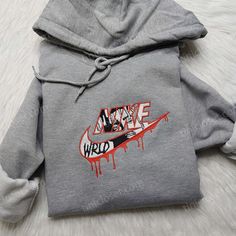 Juice Wrld Nike Embroidered Sweatshirt, Nike Logo Embroidered Hoodie, Celebrity Embroidered Shirt Welcome to our clothing store where we offer a wide selection of high-quality clothing items, including embroidered sweatshirts, t-shirts, and hoodies. We take pride in our attention to detail and craftsmanship, which is evident in our collection of Juice Wrld Nike embroidered sweatshirts. These sweatshirts are the perfect blend of comfort and style, featuring Juice Wrld x Nike logo embroidered on t Trendy Streetwear Sweatshirt With Custom Embroidery, Trendy Custom Embroidery Sweatshirt For Streetwear, Trendy Embroidered Hooded Sweatshirt, Embroidered Long Sleeve Trendy Hoodie, Trendy Long Sleeve Embroidered Hoodie, Embroidered Graphics Hoodie For Streetwear, Long Sleeve Hoodie With Embroidered Graphics For Streetwear, Embroidered Sweatshirt For Streetwear In Winter, Embroidered Hoodie For Fall Streetwear