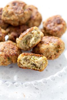 some meatballs are on a plate and ready to be eaten