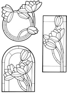 three stained glass windows with flowers and leaves in the center, one is black and white