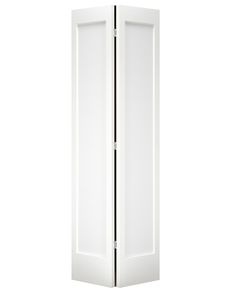 a tall white room divider with two doors