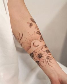 a person with a tattoo on their arm