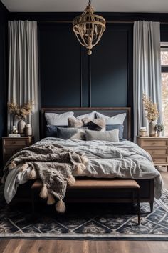 a bedroom with dark blue walls and wooden furniture