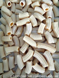 several pieces of uncooked banana peels on a baking sheet, ready to be cooked