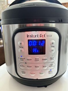 an instant pot with the time displayed on it