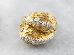 A bypass of rich, high 18 karat textured gold gives this ring an organic look, like feathers or petals wrapping about the finger! Bright diamonds of excellent color glitter at the centers, nestled securely in the gold. Intended to be worn every day, this piece is designed for comfort, as well as style, and will work well stacked with other rings! Metal: 18K Yellow Gold Gem: 18 Diamonds totaling .26 Carats Gem Measurements: 1.5 mm, Round Ring Size: 4.75 Marks: "18K" Stamped on the inside band Cocktail Ring Diamond, Yellow Gold Sapphire Ring, Rings Metal, Diamond Cocktail Ring, Diamond Engagement Rings Vintage, Bypass Ring, Cameo Ring, Diamond Cocktail Rings, Gold Diamond Ring