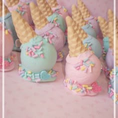 there are many small cakes that look like ice cream cones