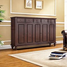 a living room scene with focus on the armoire