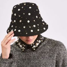 Nwt Authentic Lele Sadoughi Jet Black Woven Knit Jeweled Bucket Hat. Hand Embellished With Round & Oval Crystals Faux Pearls & 4mm 14k Gold Plated Beads. Cotton Lined With Lele’s Luxe Crown Logo Print. 14k Gold Plated Trademark Logo Charm On Hat. Brand New With Tag Come In Original Pouch No Damages Nor Stains No Missing Stones Nor Snags Review All Pics/Video Before Purchase Approx Measurements: 22” Circumference Questions Are Welcome Before Purchase Cold Weather Hats, Trademark Logo, Lele Sadoughi, Crown Logo, Sunglass Chain, Fancy Hats, Hat Making, Free Knitting, Diy Fashion