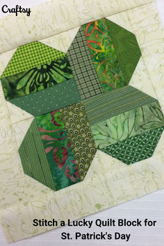 a close up of a patchwork quilt with the words stitch a lucky quilt block for st patrick's day