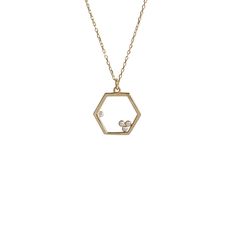 Hexagon Style 14K Gold Necklace - Contemporary Elegance (1.73 Grams, 45cm) Adorn yourself with modern elegance wearing our Hexagon Style 14K Gold Necklace, a unique piece that seamlessly marries contemporary design with the timeless allure of 14K gold. Meticulously crafted, this necklace is designed to be a statement of sophistication and individuality. Key Features:     Luxurious 14K Gold:         Revel in the opulence of 14K gold, with a weight of 1.73 grams. The radiant gold content adds a to Octagon White Gold Diamond Necklace Gift, White Gold Octagon Diamond Necklace Gift, White Gold Octagon Diamond Necklace For Gift, Elegant Octagon Yellow Gold Diamond Necklace, Elegant White Gold Octagonal Necklaces, Elegant Yellow Gold Octagon Diamond Necklace, Elegant White Gold Octagon Necklace, Hexagon-shaped 14k Gold Jewelry, White Gold Hexagon Jewelry For Formal Occasions