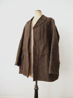 "1930s Romanian brown wool jacket. This is a piece of traditional folk clothing sources from the Transylvania area of Romania. It has really interesting horizontal pockets on the centre front and then two lower pockets with shaped flap covers. The back is shaped across the shoulders with a back tab panel.  Measures: 22\" underarm to underarm, 18\" across the shoulders, 24\" sleeves, 31\" long from top of shoulder to hem. Condition: good overall. There is some damage and a few holes. Mainly on th Folk Clothing, Hold Ups, Traditional Clothing, Wool Jacket, Jacket Coat, Traditional Outfits, Warm Winter, Romania, Overalls