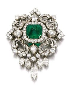 Handmade item Recycling: No Brooch weight: 25.780 Grams Brooch Length: 3.00 inches Brooch Width 2.00 inches Gemstones: Rose cut diamonds & Emerald Diamonds weight: 5.35 carats Diamond shape: Round & Pear Diamond Colure: Light Tinted Brown Emerald weight : 4.88 Carats Emerald: Lab Created Stone putting: Prong Material: Silver Silver purity: 925 Brooch Finished: Antique Emerald Brooch, Diamond Brooch, Silver Brooch, Pear Shaped Diamond, Emerald Jewelry, Van Cleef, 925 Sterling Silver Earrings, Modern Jewelry, Turquoise Jewelry