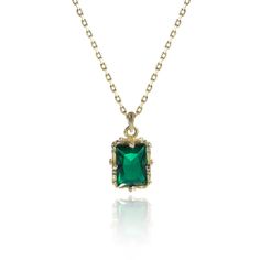 This exquisite ensemble exudes timeless beauty, featuring captivating emerald green emerald-cut gemstones meticulously set in lustrous sterling silver with delicate gold accents. The necklace showcases the stunning stone on a graceful chain, while the matching earrings mirror its splendor. The rich green hue, combined with the classic yet modern design, makes this set a statement of refined luxury, perfect for both formal occasions and everyday elegance, capturing the essence of sophistication a Baguette Pendant, Emerald Set, Everyday Elegance, Rich Green, Luxury Gift Box, Green Emerald, Silver Pieces, Emerald Cut, Gold Accents