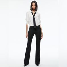 Alice + Olivia Classics Signature Bootcut Pant, That Feels Perfectly Tailored For Anything (Office Or After Hours). The Wide Waistband Is Incredibly Flattering (Not That You Need Any Help). Bootcut Pant, Wide Waistband, Mid-Rise, Flare Leg, Hidden Front Button And Zipper Closure 50% Wool, 45% Viscose, 5% Elastane Dry Clean Only Imported A+O Sustainability: Created With Manmade Cellulosic Viscose & Natural Wool Blend That Is Bio Degradable Front Rise: 9 1/4” Back Rise: 14 1/4” Inseam: 35” Fits Tr Elegant Business Casual Pantsuit With Long Pants, Olivia Black, Bootcut Pants, 70s Inspired, Inspired Fashion, After Hours, Wide Waistband, Alice Olivia, Natural Wool