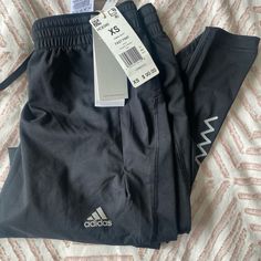 Nwt Adidas Women’s Running Pants. Size Xs. Super Comfortable For Working Out Or Lounging. Two Zippered Pockets. No Trades Adidas Sportswear Sweatpants For Gym, Adidas Athleisure Sweatpants For Gym, Adidas Sportswear Joggers For Sports, Adidas Sportswear For Jogging, Adidas Logo Sportswear Joggers For Sports, Adidas Logo Sportswear Joggers, Adidas Logo Sportswear For Jogging, Activewear With Adidas Logo For Jogging, Adidas Gym Pants With Three Stripes