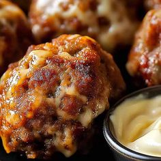 cheese stuffed meatballs with sauce on the side