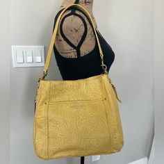 American Leather Co. Austin Shoulder Bag. Daffodil Tooled Alc23185. Approximately 11.5” X 10.5” X 5.25”. Drop Approximately 10”. Yellow Shoulder Bag With Double Handle, Yellow Rectangular Hobo Bag With Detachable Handle, Yellow Textured Leather Travel Bag, Yellow Shoulder Bag With Removable Pouch, Elegant Yellow Hobo Tote Bag, Elegant Yellow Hobo Bag For Everyday Use, Elegant Yellow Hobo Bag For Daily Use, Elegant Yellow Hobo Bag For Everyday, Yellow Hobo Bag With Detachable Handle For Daily Use