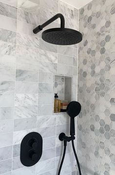 a shower head with thermostaer and hand held shower faucet