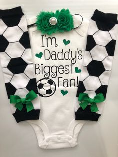 "*CURRENT PROCESSING TIME: 3-6 business days before shipment* This is a perfect outfit for your tiny little soccer fan! :) THIS IS CUSTOMIZABLE! CHOOSE from one or all 3 pieces from the drop-down bar. If you choose \"FULL 3 piece set\", you will receive: bodysuit, headband and legwarmers LEG WARMERS WILL BE LARGE ON babies under 15lbs (but can be rolled) PIECES INCLUDE: (you will choose your pieces from drop-down bar) 1. long or short sleeved \"I\"m Daddy's biggest fan\" (or Mommy's Biggest fan) Soccer Girls Outfits, Girls Football Outfit, Checkered Outfit, Racing Baby, Soccer Baby, Hunting Baby, Soccer Outfit, Soccer Fan, Camo Baby Stuff