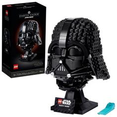 the lego star wars darth vader helmet is shown in front of a box