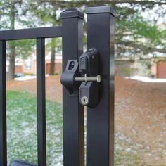 a black gate with a lock on it