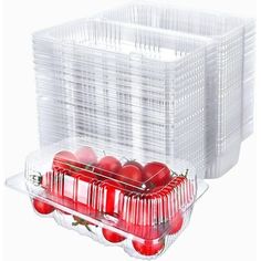 plastic containers filled with red apples on top of a white background and two clear bins behind them