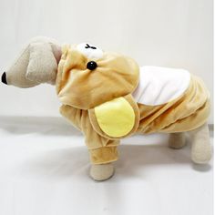 a stuffed dog is wearing a white shirt